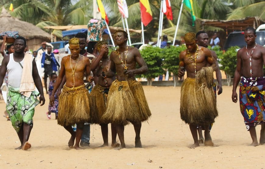 Beninese woman in traditional white voodoo ceremony dress