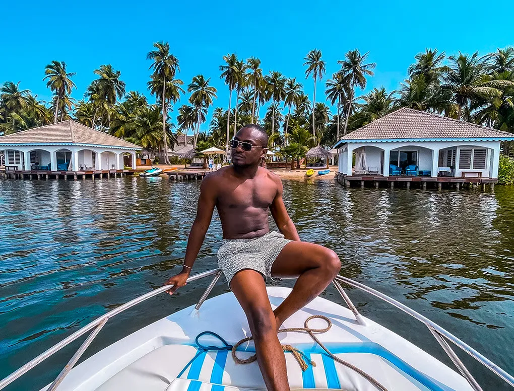 Lagoon resort with palms at Assinie, Cote d'Ivoire