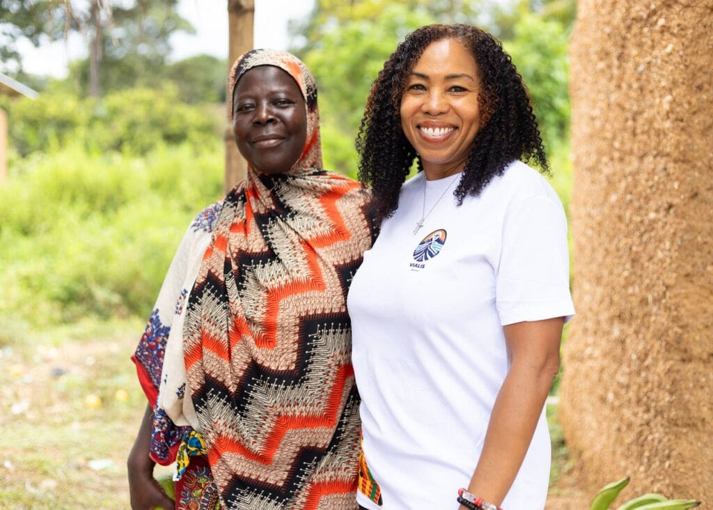 Kim Hampton, co-founder of Vialis Travel, with a local woman in Ghana