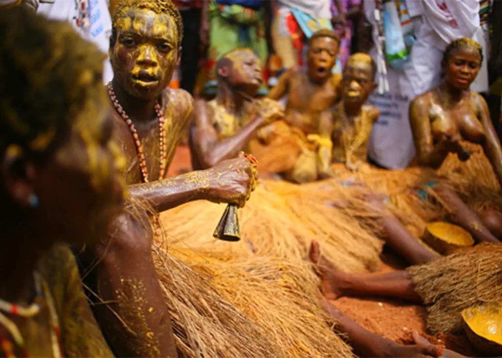 Voodoo ceremony with costumed dancers in Togo